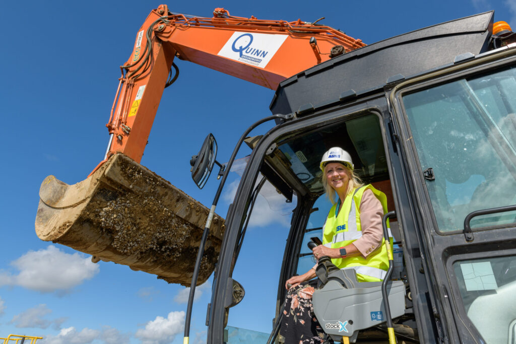Ashe Group worker on a digger