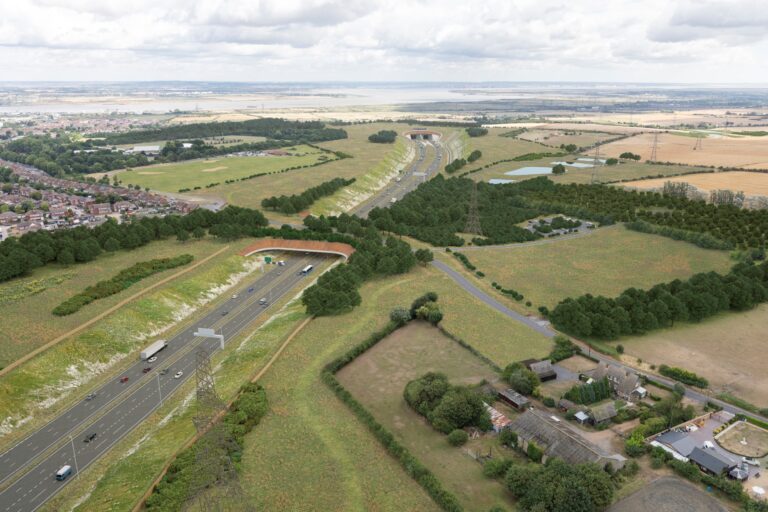 A Visual Representation Of The Lower Thames Crossing, Showcasing The Integration Of New Road Infrastructure With Extensive Green Space, Tree Planting, And Wildlife-Friendly Design Features Including Green Bridges And Cuttings To Reduce Environmental Impact.