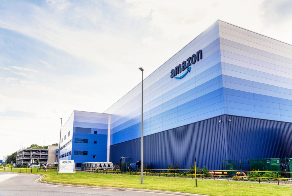 Large Amazon Distribution And Logistics Warehouse In The Uk, Illustrating The Scale Of Major Commercial And Logistics Sites.