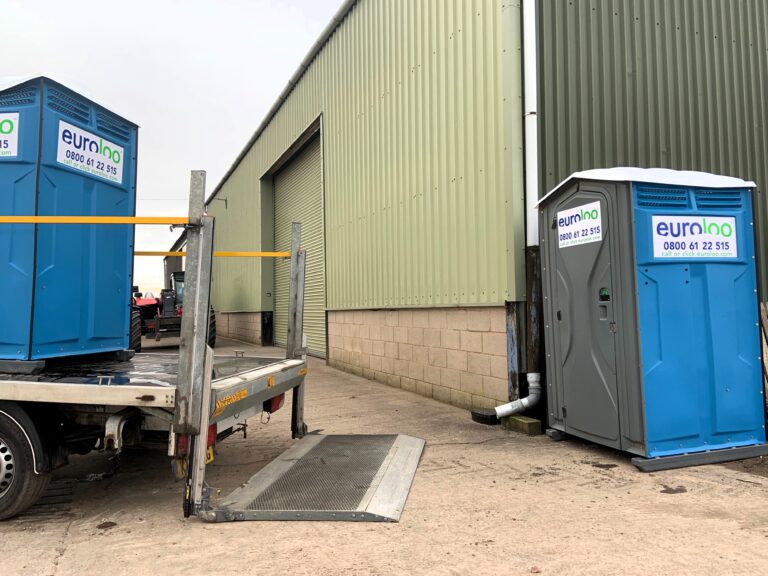 Portable Toilets At A Remote Distribution Yard Provided By Euroloo For Driver Welfare Compliance