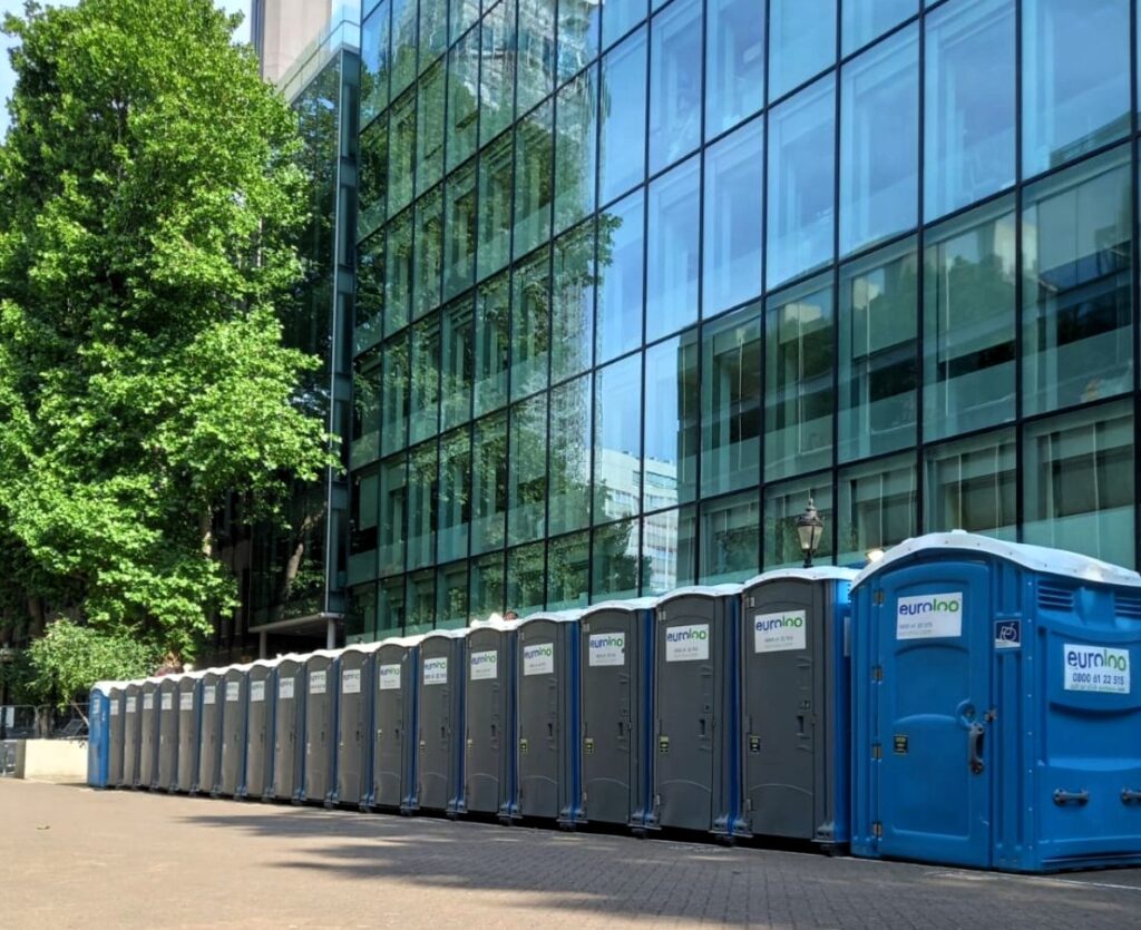 Emergency Portable Toilets Outside Office Block During Daytime Water Outage