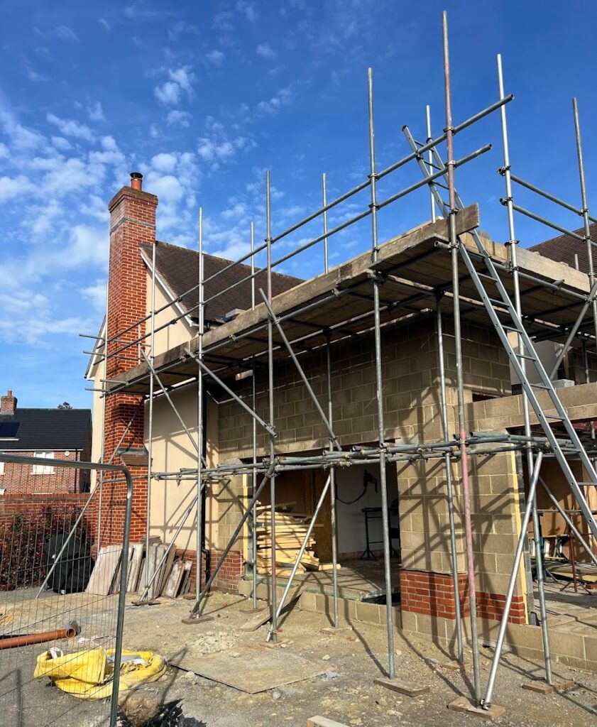 Portable toilet on a domestic building site for a house extension