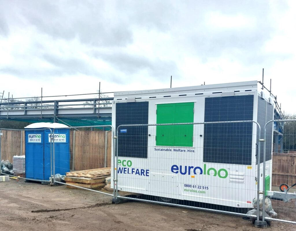 Solar farm construction site setup with portable toilets and welfare units